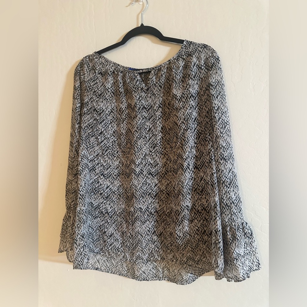 Sheer print blouse.